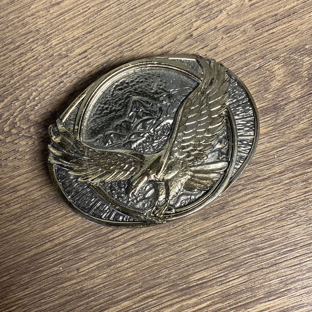 Silver and gold belt buckle